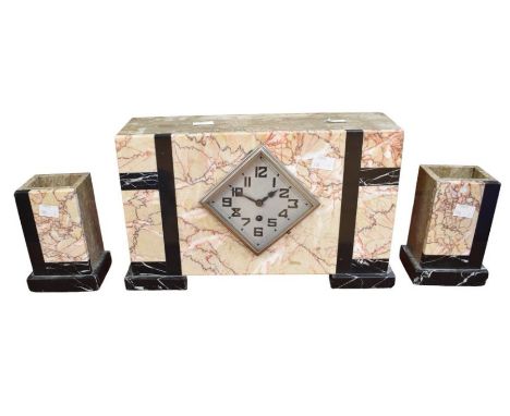 A 1930s marble art deco mantel clock with garnitures, diamond shaped face, Arabic numerals. 8 day.
