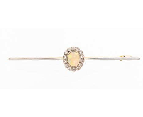 A Edwardian opal and diamond platinum 18ct gold bar brooch, comprising an oval opal approx 8 x 6mm, orange and green play of 