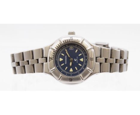 A ladies Carrera Sport 100 steel cased wristwatch, comprising a round signed blue dial, with lume batton and arrow markers, d