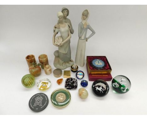 A collection of Caithness paperweights, other glass paperweights, trinket/pill boxes, Spanish figures and a doll's head from 