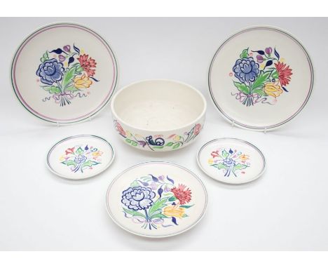 A collection of mid 20th century Poole plates and bowl.