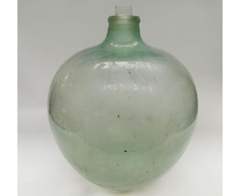 A large vintage glass bubble bottle with original glass stopper