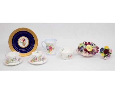 Shelley - A part floral decorated tea service consisting of milk jug, sugar bowl, twelve cups and thirteen saucers, eight sid