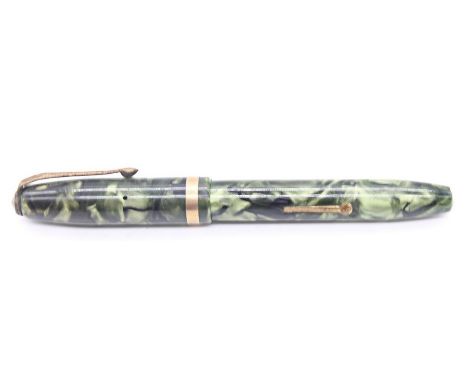 A vintage faux marble style green and black fountain pen, length approx 11.5cm, circa 1950s Further details: good- some wear 