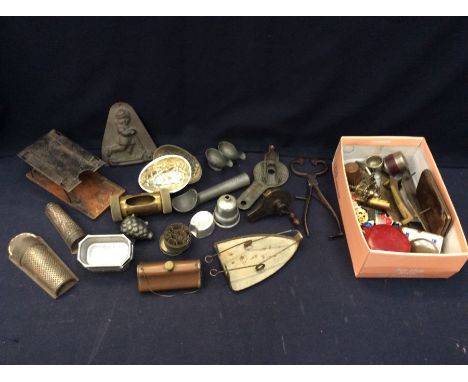 An interesting lot containing Art Deco door handles, Easter egg moulds, nutmeg graters, sugar snips, vintage RAC badges, ARP 