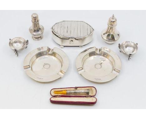 A collection of silver to include; A pair of Mappin & Webb silver ash trays, each engraved "Jack Sante 1902" and both with a 