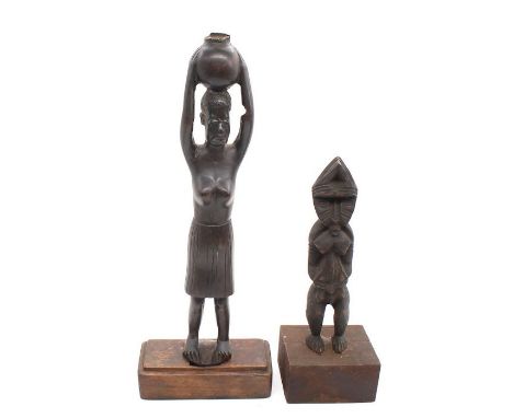 African Art: Two tribal art figures, both made of wood, one of lady with urn above head, other tribal art geometric designed 