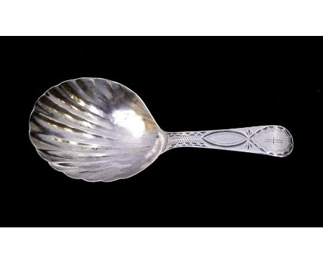 A George III silver caddy spoon, shell shaped bowl, engraved decorated handle and initialled cartouche to terminal, hallmarke