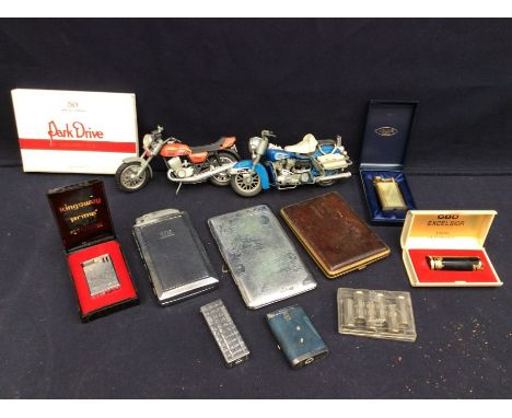 Collection of cigarette, lighter cases and two toy motorbikes&nbsp;