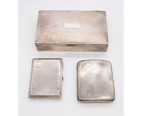 An Art Deco engine turned silver cigarette box, fitted interior and leather base, hallmarked Birmingham, 1939, Sanders & Mack