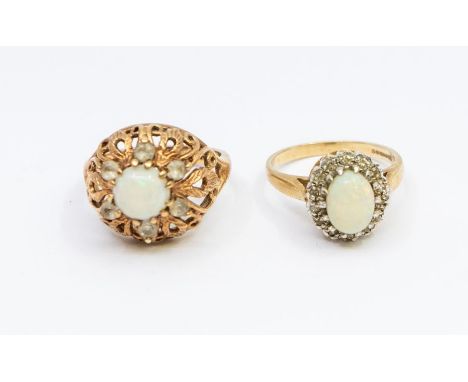 Two opal set 9ct gold dress rings, including an oval cluster set with an oval opal to the centre within a border of small dia