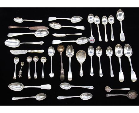 A collection of silver spoons to include; a George III silver fiddle and thread pattern condiment ladle, hallmarked London, 1