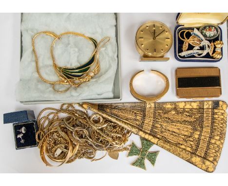 A collection of costume jewellery to include a paste set ribbon brooch by Boucher, marked Boucher 5493, gilt bow stone set ne