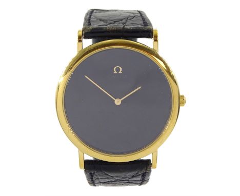 Omega De Ville gentleman's gold-plated and stainless steel quartz wristwatch, Cal. 1378, black dial, on Omega black leather s