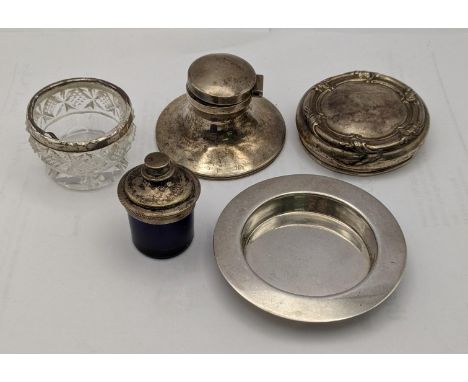 Silver to include a caption inkwell, a dish, a lid, a glass salt and a blue glass and silver plated inkwellLocation: 