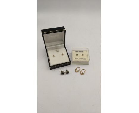 Mixed gold earrings to include a pair of 14ct and pearl earrings, 1.2g along with three pairs of 9ct gold earrings, 1.7gLocat