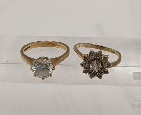 Two 9ct gold rings set with paste clear stones, 5.9gLocation: 