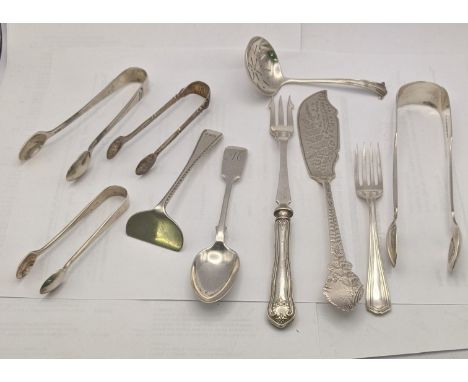 Silver o include four sugar tongs, a sifter spoon, fork, spoon a pusher and a silver handled picked fork 235.7gLocation: 