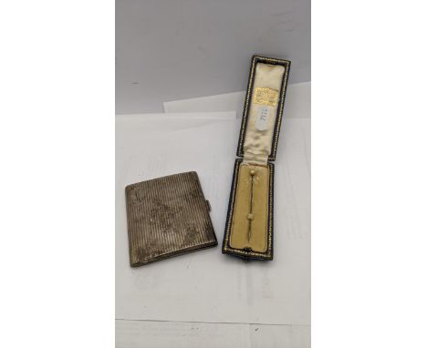 A silver cigarette case together with a white metal stick pin 97.1gLocation: 