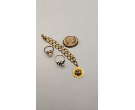 A 9ct gold ring set with a central pearl and with a yellow metal ring, tested as 9ct, 5.6g and other itemsLocation: 