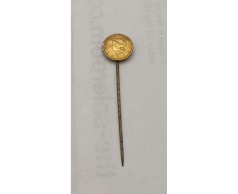 USA - A late 19th century Liberty head dollar mounted on a stick pinLocation: 