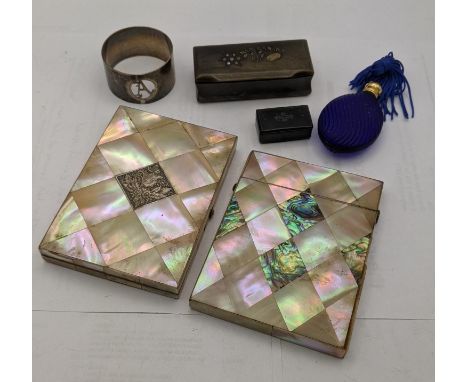 A mixed lot to include two mother of pearl card cases together with a silver napkin ring, along with an 18th century ladies s