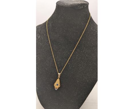 A 9ct gold necklace having a pendant inset with coloured glass stones 3.8g 