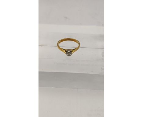 A 18ct gold ring set with a central diamond total weight 2.2gLocation: 