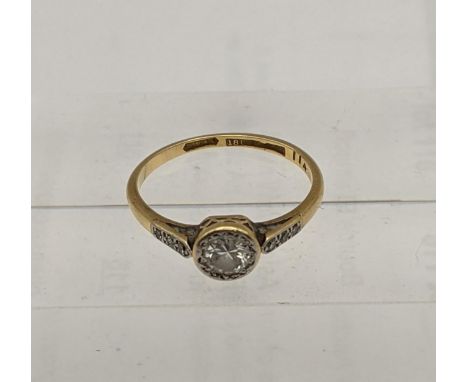 A 18ct gold ring set with a diamond 2.4gLocation: 