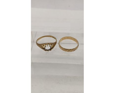 A 9ct gold wedding band together with one other total weight 3.5gLocation: 