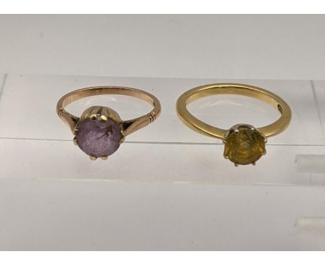 Two 9ct gold rings, one set with an amethyst coloured stone and one other, total weight 6.8g, Location: 