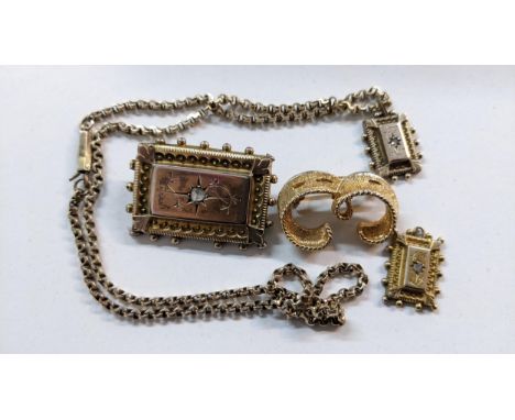 A selection of gold plated jewellery to include a Victorian brooch inset with an old cut diamond Location: 
