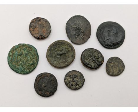 Ancient Greece - A group of nine bronze coins to include, Helmeted head of Athena in crested Corinthian helmet example, and o