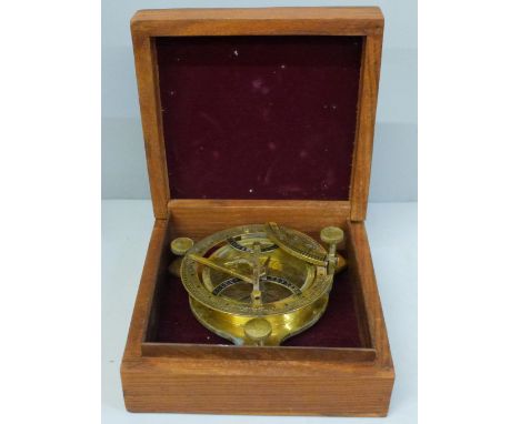 A reproduction brass sextant, boxed 