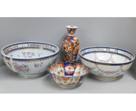 Two large porcelain punch bowls, restored, an Imari vase and an Imari bowl on stand **PLEASE NOTE THIS LOT IS NOT ELIGIBLE FO