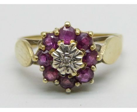 A 9ct gold, ruby and diamond cluster ring, 2.7g, P 