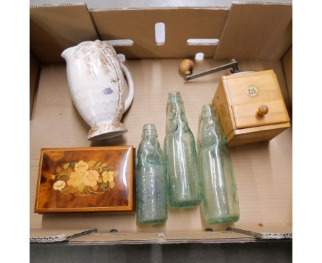 A musical jewellery box, a Beswick jug, three glass bottles and a wooden grinder **PLEASE NOTE THIS LOT IS NOT ELIGIBLE FOR P