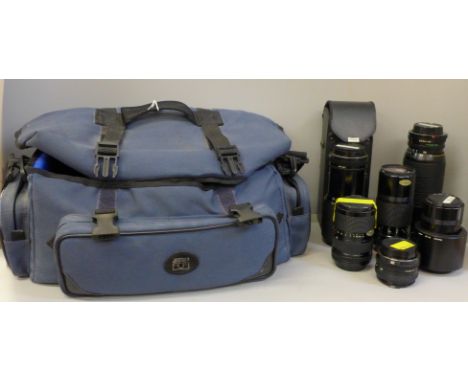 Six Canon camera lenses, 100-300mm, 70-210mm, 200mm, 135mm, 35-70mm and 50mm 