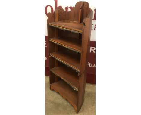 A vintage reclaimed beech canoe bookcase