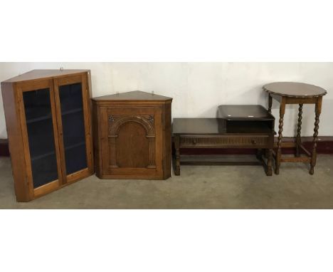 An oak freestanding corner cupboard, a barleytwist occasional table and a telephone seat