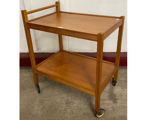 A teak two tier cocktail trolley 