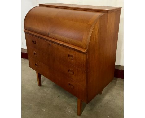 A Swedish S.M.I teak cylinder bureau, designed by Egon Ostergaard