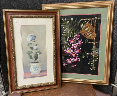 A silk embroidery and a still life print of flowers, framed