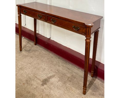 A Regency style mahogany two drawer console table 