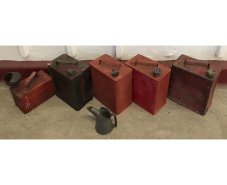 Assorted vintage Esso and other oil cans 
