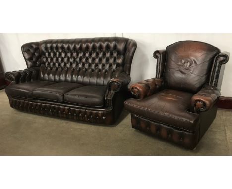 A chestnut brown leather Chesterfield wingback settee and armchair 