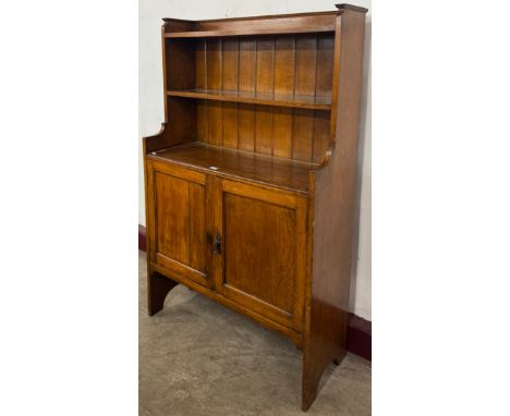 An Arts and Crafts oak dresser 