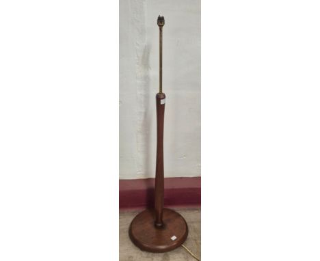 A teak floor standing lamp 
