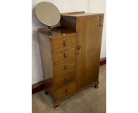 An Art Deco oak bachelors wardrobe 