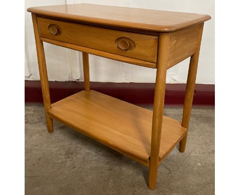 An Ercol Blonde ash single drawer Windsor hall table 